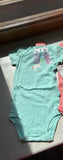 Carter’s Unicorn Onesie. Size: 9m