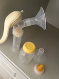 Medela Hand Pump With Measuring Bottle