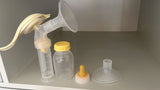 Medela Hand Pump With Measuring Bottle