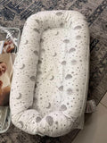 Giggle Sleeping Nest Baby in Bed